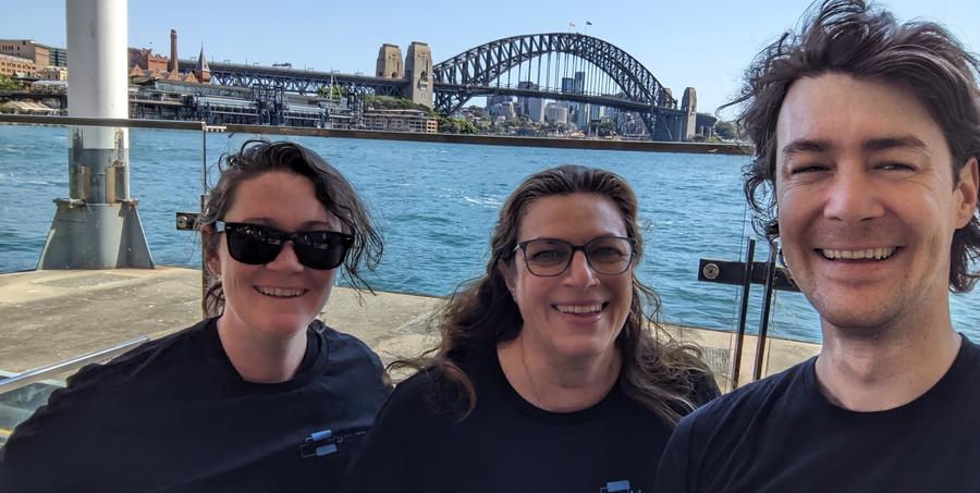 Ligantic team members on a Sydney Harbour waterfront